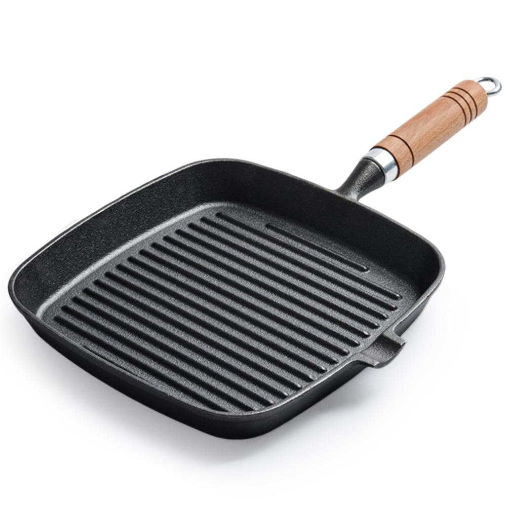 Parrilla de hierro fundido antiadherente de 9,25 pulgadas con mango de madera para cocinar en interiores y exteriores.