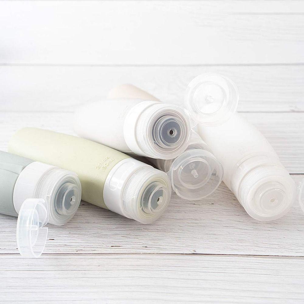 4Pcs/Set Soft Silicone Travel Bottle Empty Refillable Lotion Bottle Sub-bottling Tool