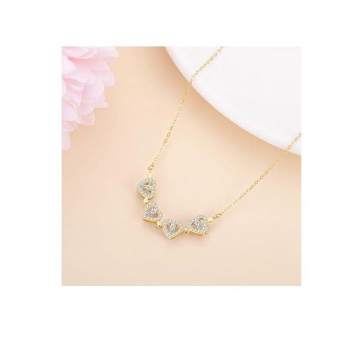 Collier trèfle à quatre feuille en forme de coeur en doré blanc