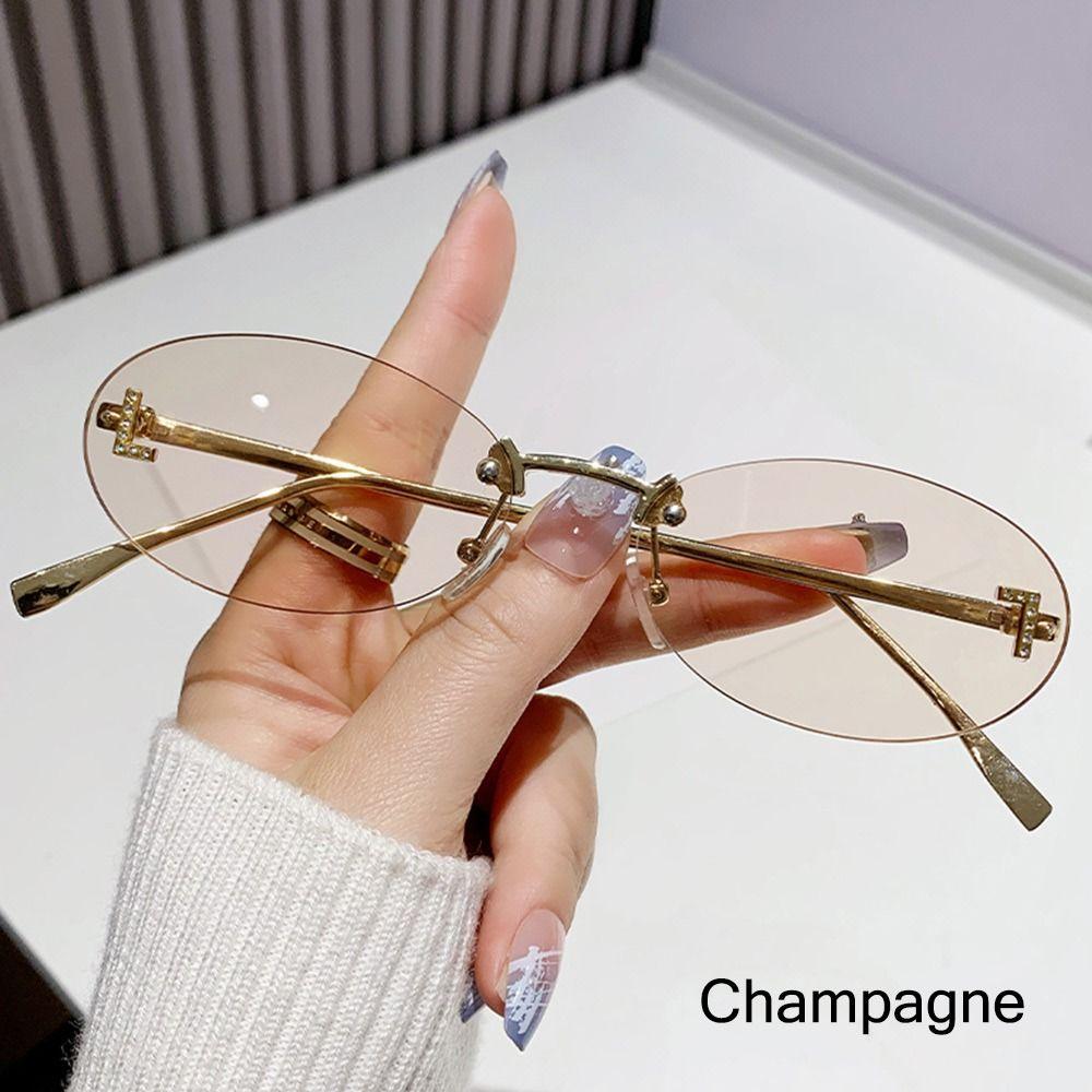 Modische ovale Sonnenbrille für Damen, Luxusqualität, Buchstabendekor, Sonnenbrille, trendige randlose Katzenaugen-Brille, UV400-Schutz, Metall