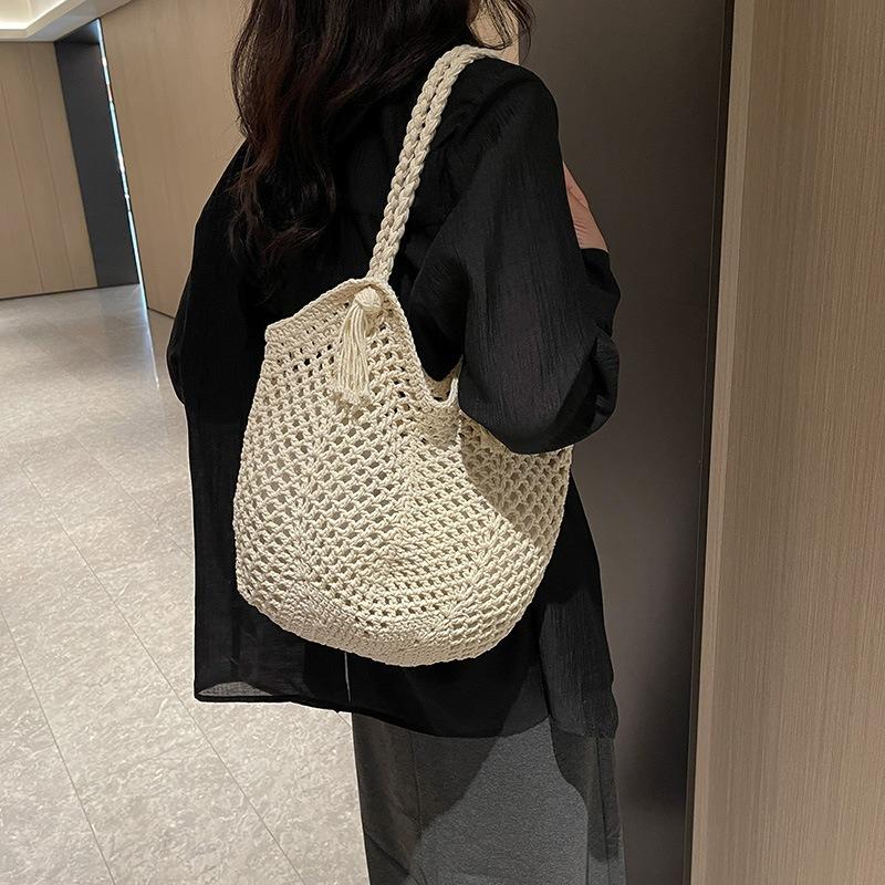 Hollow knitted bag women's large-capacity new summer shoulder knitted bag seaside vacation beach bag