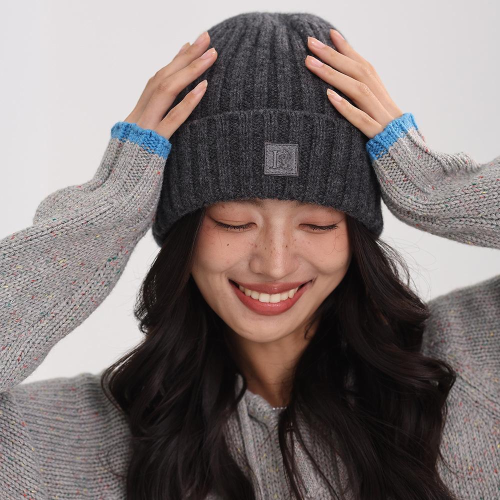 0% wool hat women's autumn and winter loose wool hat new warm advanced sense solid color crimping ear protector cold hat women