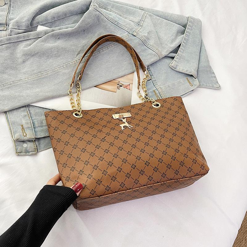 Damentasche neu retro Nische tragbar Persönlichkeit trendig große Kapazität Mode Pendler Schultertasche Tragetasche