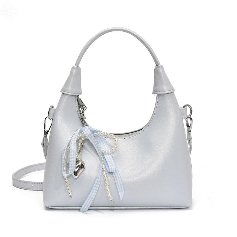 

This year, the Korean version of ins is popular, simple solid color oil wax leather handbag bag, women s fashion commuter high-end messenger bag. синій