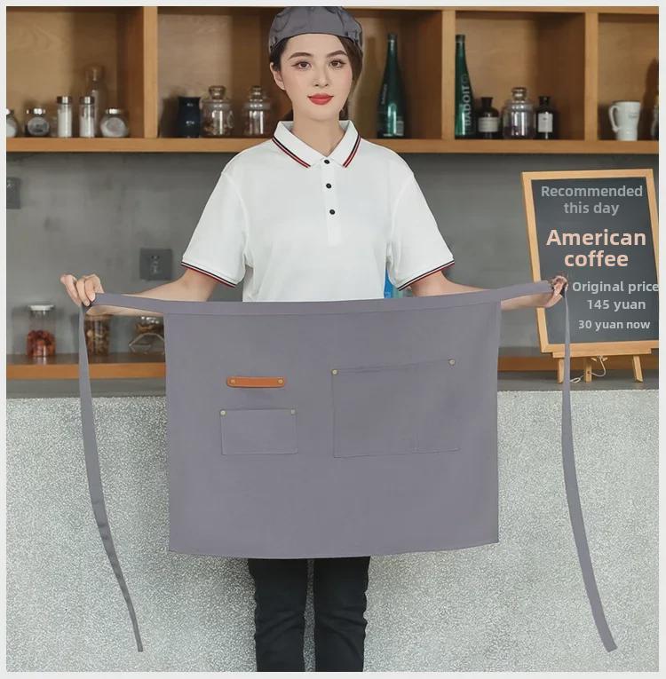 Unisex vanntett kjøkkenforkle i kanvas med halvlangt design og logo i midjen