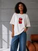 Dickes milchiges übergroßes T-Shirt mit Coca-Cola-Aufdruck