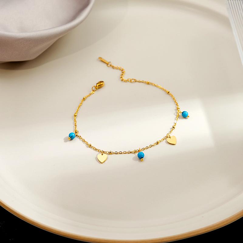 Cheville Disque Géométrique Turquoise Métallique avec Étoile à Huit Branches et Motif Papillon – Accessoire de Pied Style Niche