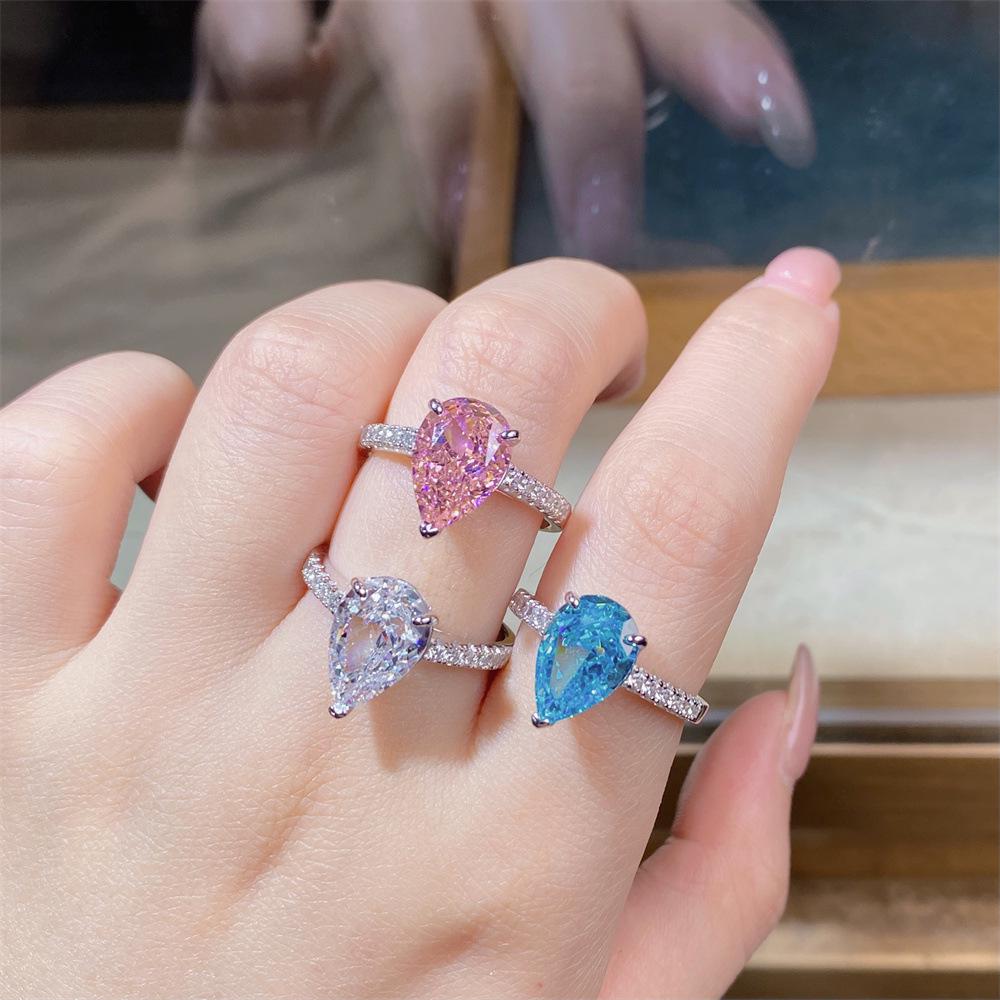Nine Beauty Jewelry Teardrop Zircon Ring: S925 Sterling Silver, Pink High-Carbon Diamond, European & American Ice Flower Cut.