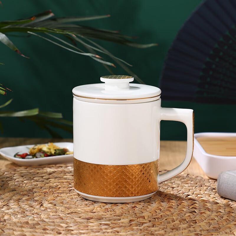 

Tanghui Gold Embossed Bone China Tea Infuser Cup