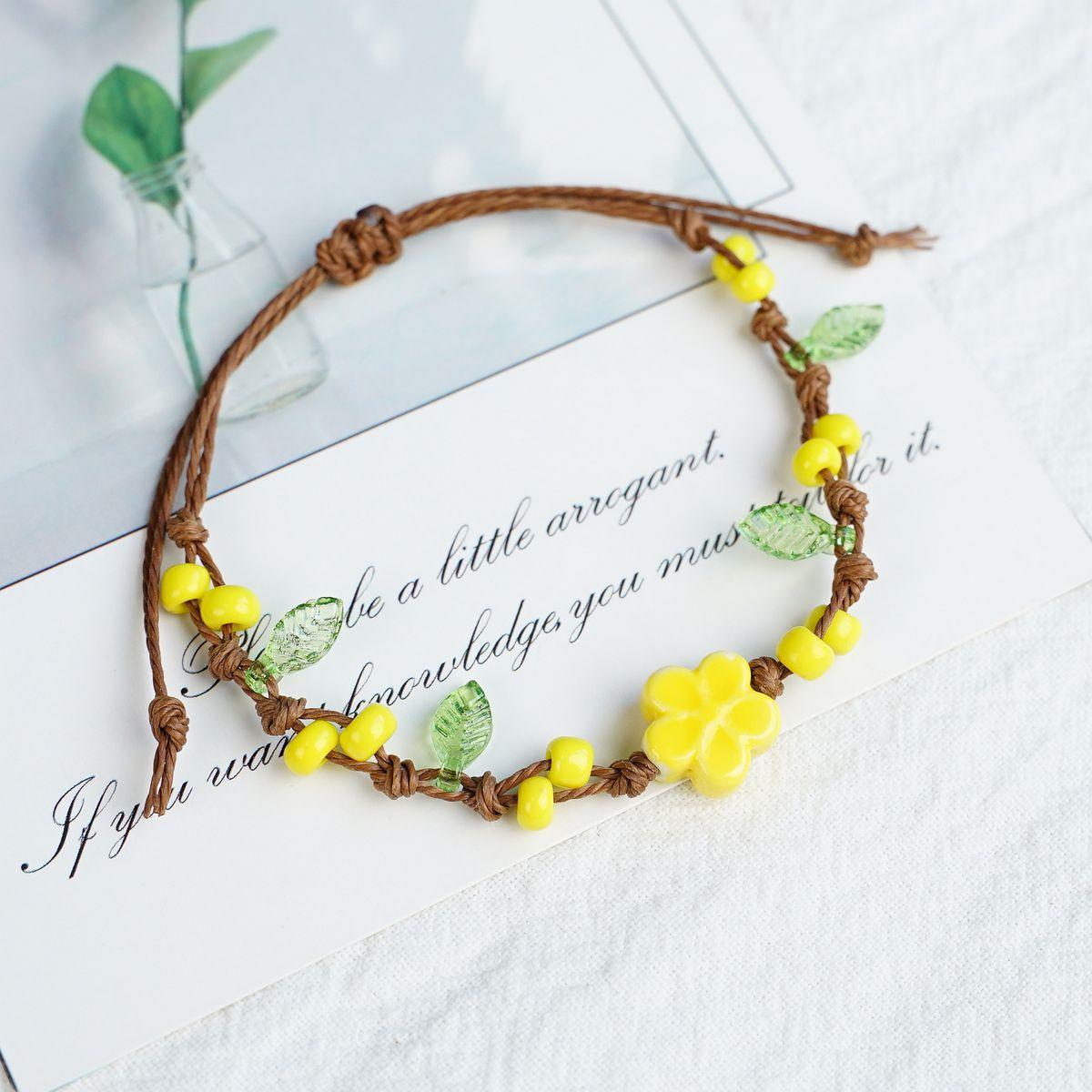 

Jingdezhen Ceramic New Year s Heavy Industry weaving four-leaf clover fresh and sweet bracelet couple student girlfriend weaving hand