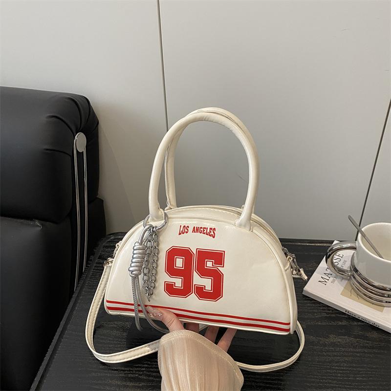Bag women's new bowling bag fashionable oily leather splicing contrasting color digital decoration portable women's handbag