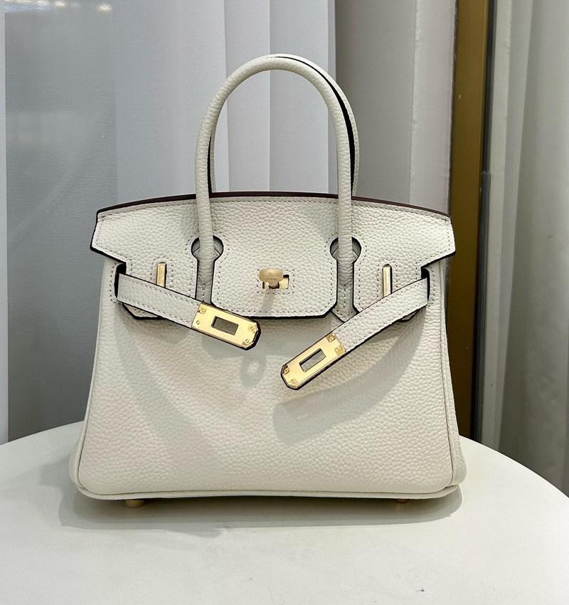 Nowy wzór Togo, skóra bydlęca pierwszej warstwy, wysokiej jakości przenośna torba listonoszka damska, duża pojemność