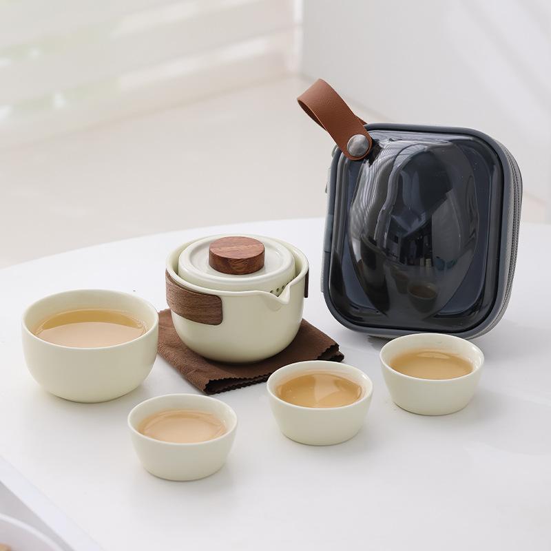 Ruyao portable travel tea set ceramics pot four cups of fast cups corporate festival set system