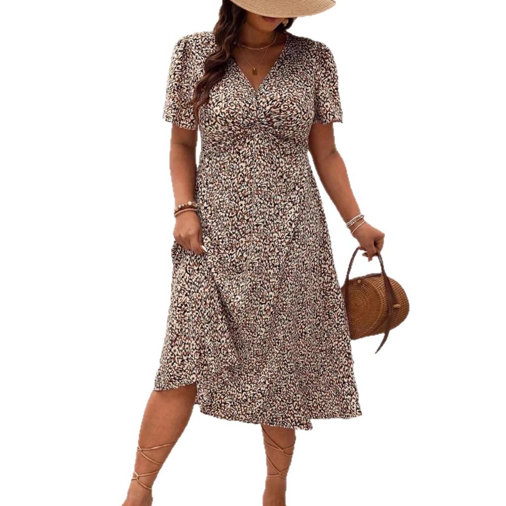 Elegantes Übersee-Leopardenmuster Übergrößenkleid - Damen Kurzarm Verdrehtes Design