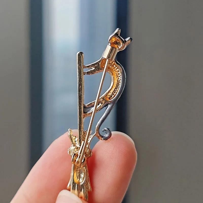 Silvery Tone Witch Cat on Broomstick Brooch - Gothic Halloween Safety Pin Charm Jewelry for Women
