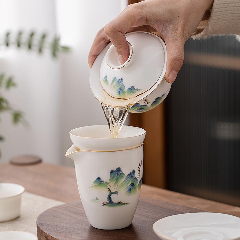 Suet Jade Tea Set Will Give Customers Ceramic Cover Bowls, Teacups, Gift Boxes, and Business Gifts.