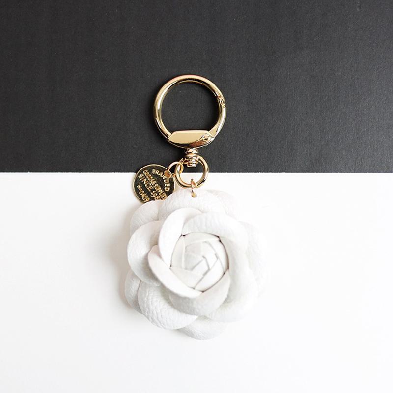 Yogodlns Cute Sweet Synthetic PU Leather Rose Camellia Flowers Bag Pendant For Women Trinket Key Chains Ring Car Bag Charm