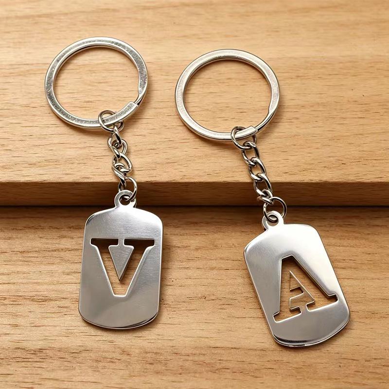 Pendentif Porte-clés 26 Lettres en Acier Inoxydable Creux - Polyvalent pour Sac à Dos, Voiture, Plaque Militaire