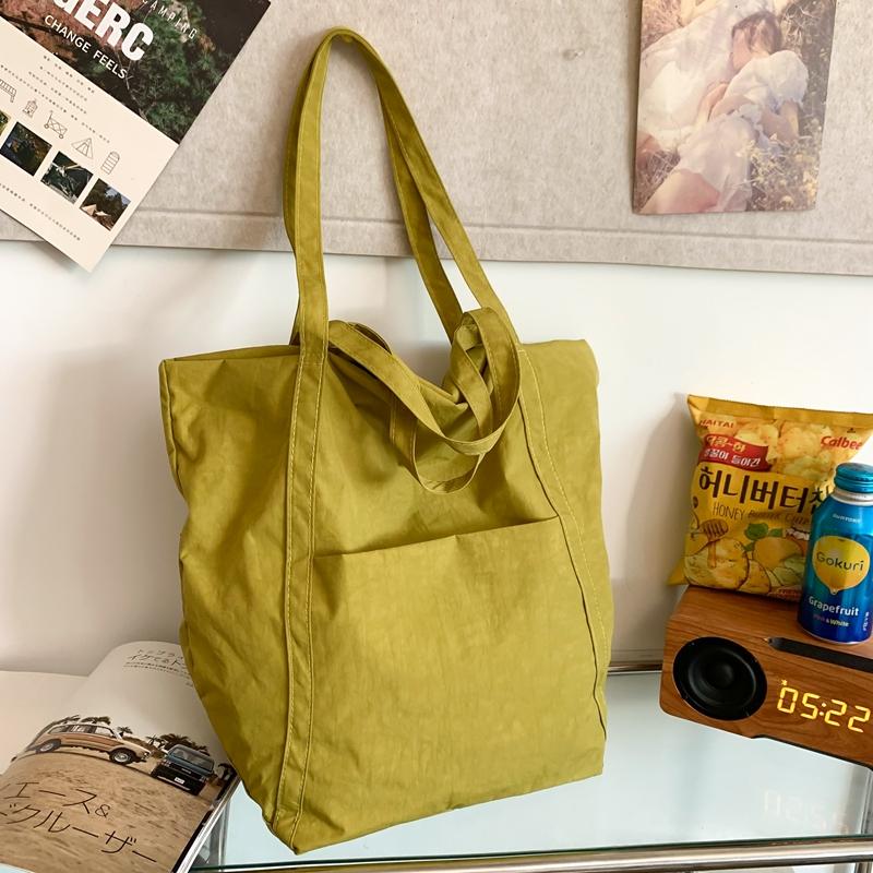 Нейлоновая сумка через плечо — фото 11