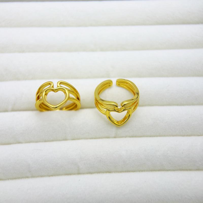 Exaggerated European Hollow Heart Gold-Plated Copper Ring - Fashionable, Long-Lasting, Unique Design for Women