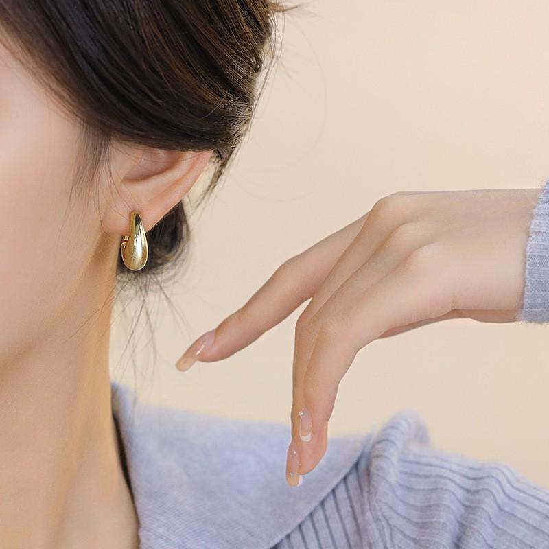Geometric Circle Stud Earrings: Stylish, Unique Metal Design for Women
