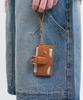 Noise Buckle Stud Card Wallet - Brown