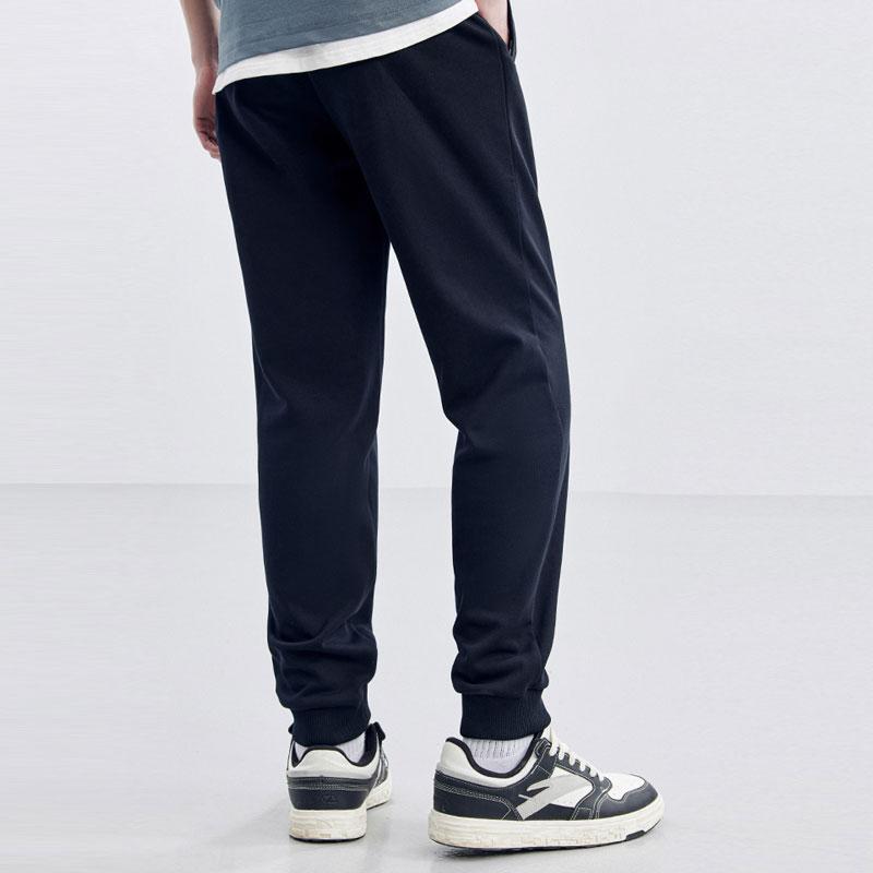 Anta Training Series Solid Color Elastic Waist Tapered Knit Sports Pants Men Pants Black 952357303-1