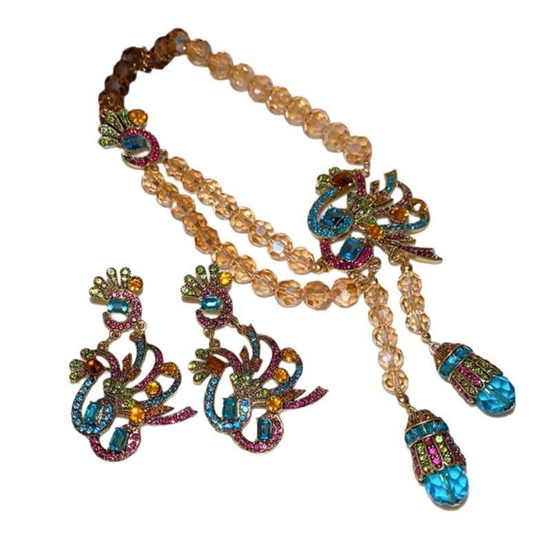 

Набор: Цветной кулон-павлин на цепочке и серебряные серьги-гвоздики для модных женщин с дизайном из страз 1