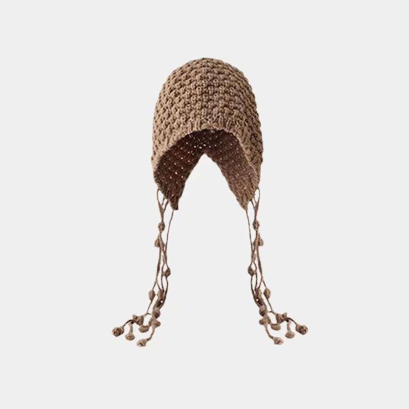 Autumn and winter hand-woven hollowed-out bald hat Warm wool hat Women's fringed ear protector Knitted hat