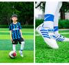 Rasenrasen natürliche Fußballschuhe Kinder rutschfeste Sportschuhe Jungen Fußballschuhe
