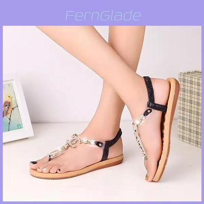 Elegante Damen Gold Gladiator Sandalen mit Strasssteinen und flachem Strand Design