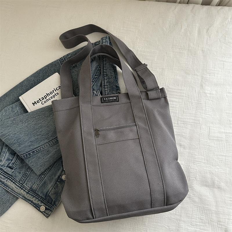 

2025 autumn and winter new versatile commuter shoulder armpit bag premium texture handbag large capacity tote bag серый