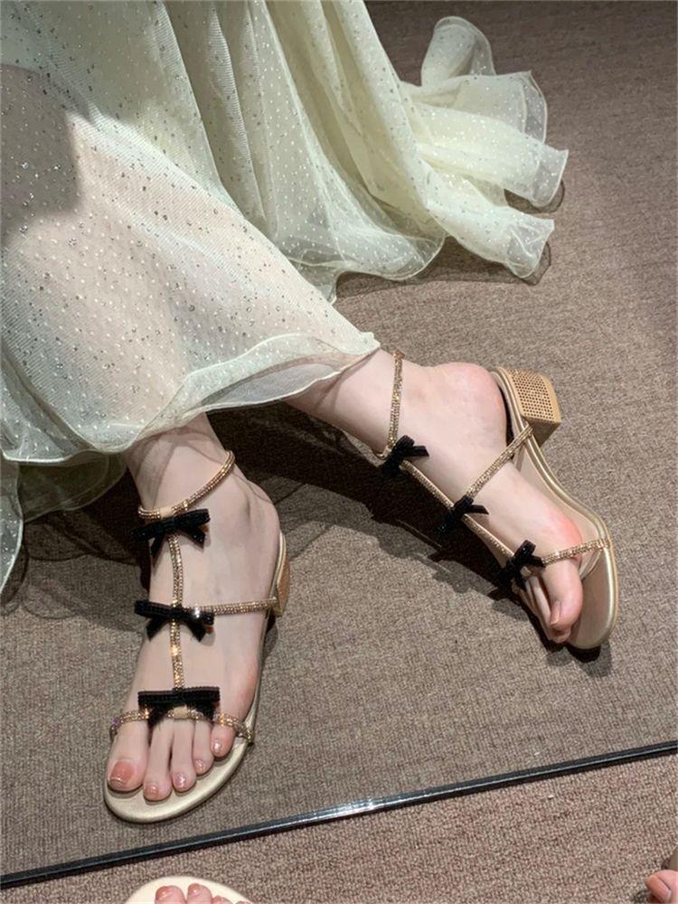Bow sexy Roman sandals female 2025 summer word with golden rhinestones fairy wear fashion new
