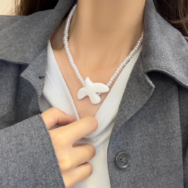 Stylish White Doves Pendant Necklace With Branch Accent Designed For Those Who Appreciate Individuality And Depth
