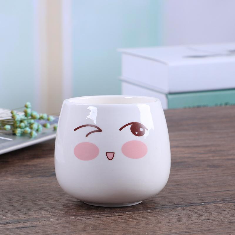 

Простий керамічний горщик для квітів, мультяшний вираз, для сукулентів, грубозернистий керамічний горщик для квітів, настільний креативний ретро горщик для рослин Diameter 7cm height 8cm