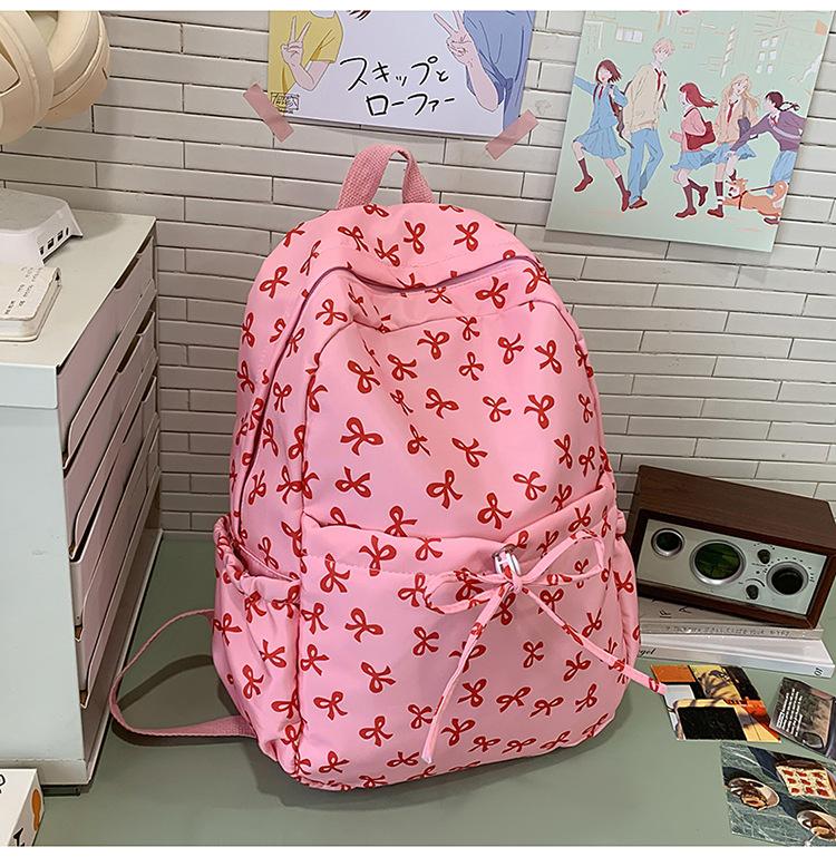 Schoolbag bow schoolbag junior high school girls ins style high value 1011 new college students Japanese travel backpack