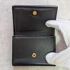 Used Beautiful condition  Prada trifold wallet, letter shape, metal logo, Vitello Daino, compact