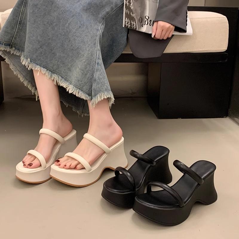 Temperament advanced sense one-word slippers women's summer wear new small thick-bottomed wedge heel high-heeled muffin slippers