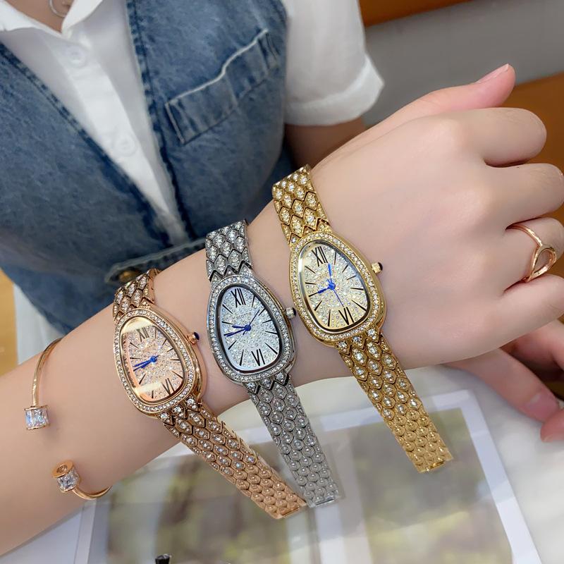 Schlangen Uhr Schlangenkopf Damen Uhr Zigeuner Stern Mit Diamanten Und Stahlarmband Lieferung Exquisite High-End Wasserdichte Damen Uhr