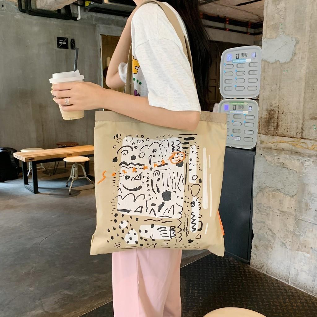 Stylish Canvas Tote Bag With Graffiti Print Large Capacity Shoulder Bag For Everyday Use