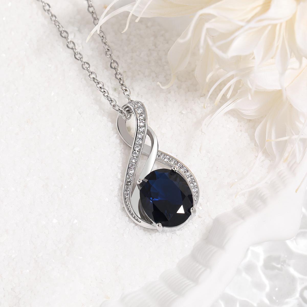 

Ожерелье из драгоценных камней неправильной формы S-образной формы с преувеличенным цветом