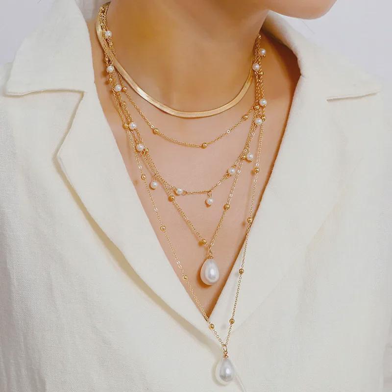 Collier Chaîne Métallique Multicouche pour Femmes avec Perles d'Imitation – Élégant, Chaîne Claviculaire Style Froid, Parfait pour l'Empilage.