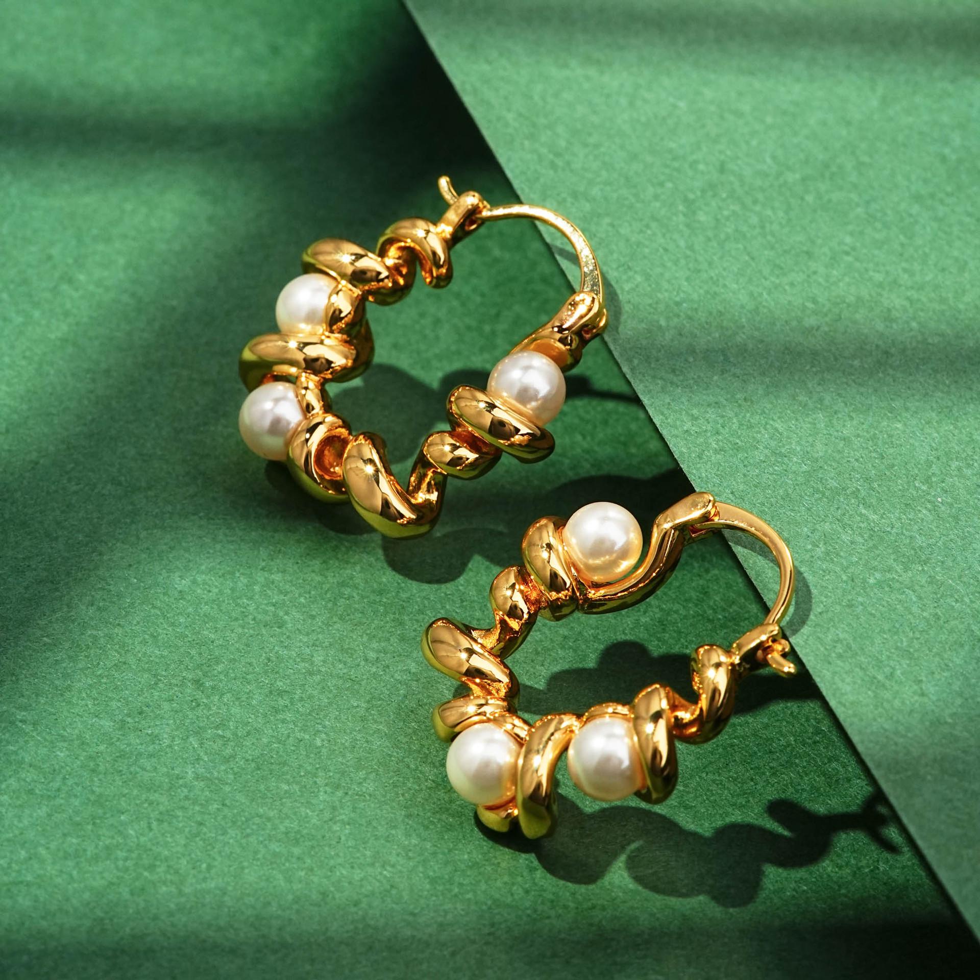 Elegant Metal Twist Pearl Earrings with Irregular Wave Design