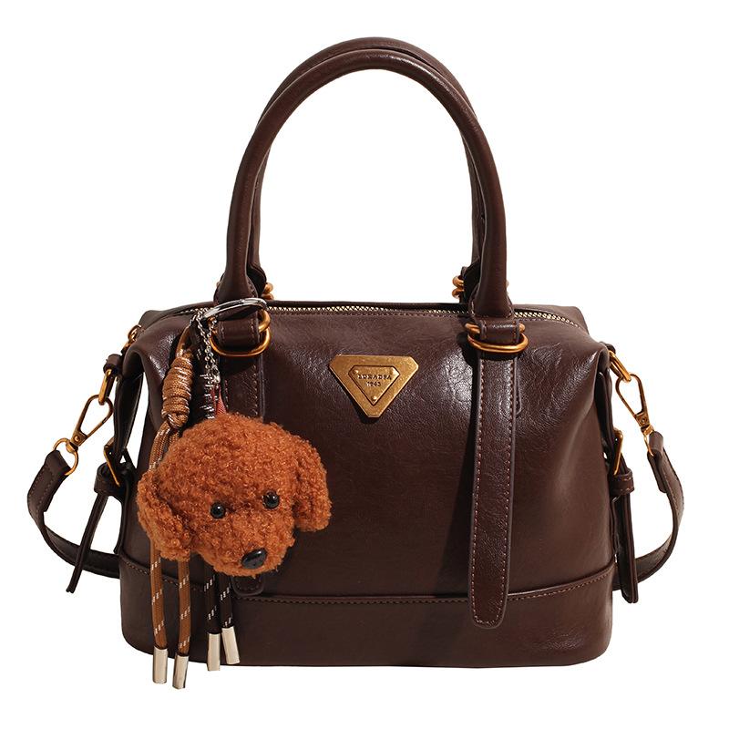 Winter Maillard retro portable bowling bag women's 2025 new fashion commuter versatile messenger pillow bag