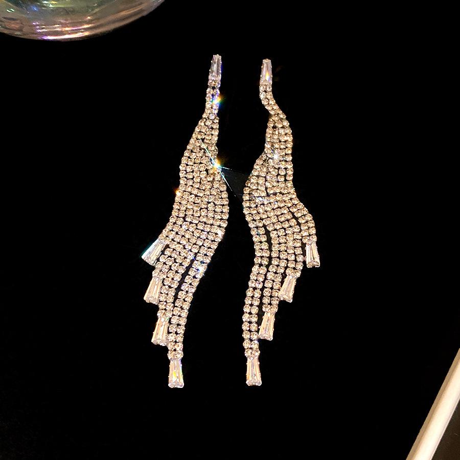 

European and American silver needle zircon diamond fringed earrings light luxury high-end stud earrings personalized design temperament earrings