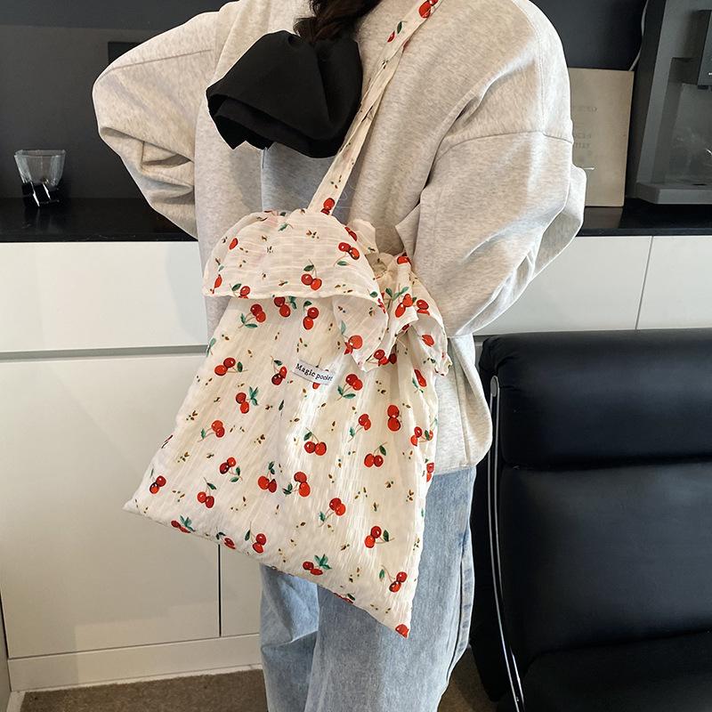 2025 spring and summer new mesh shoulder bag fairy wind lotus leaf edge handbag female vacation sewn chiffon tote bag