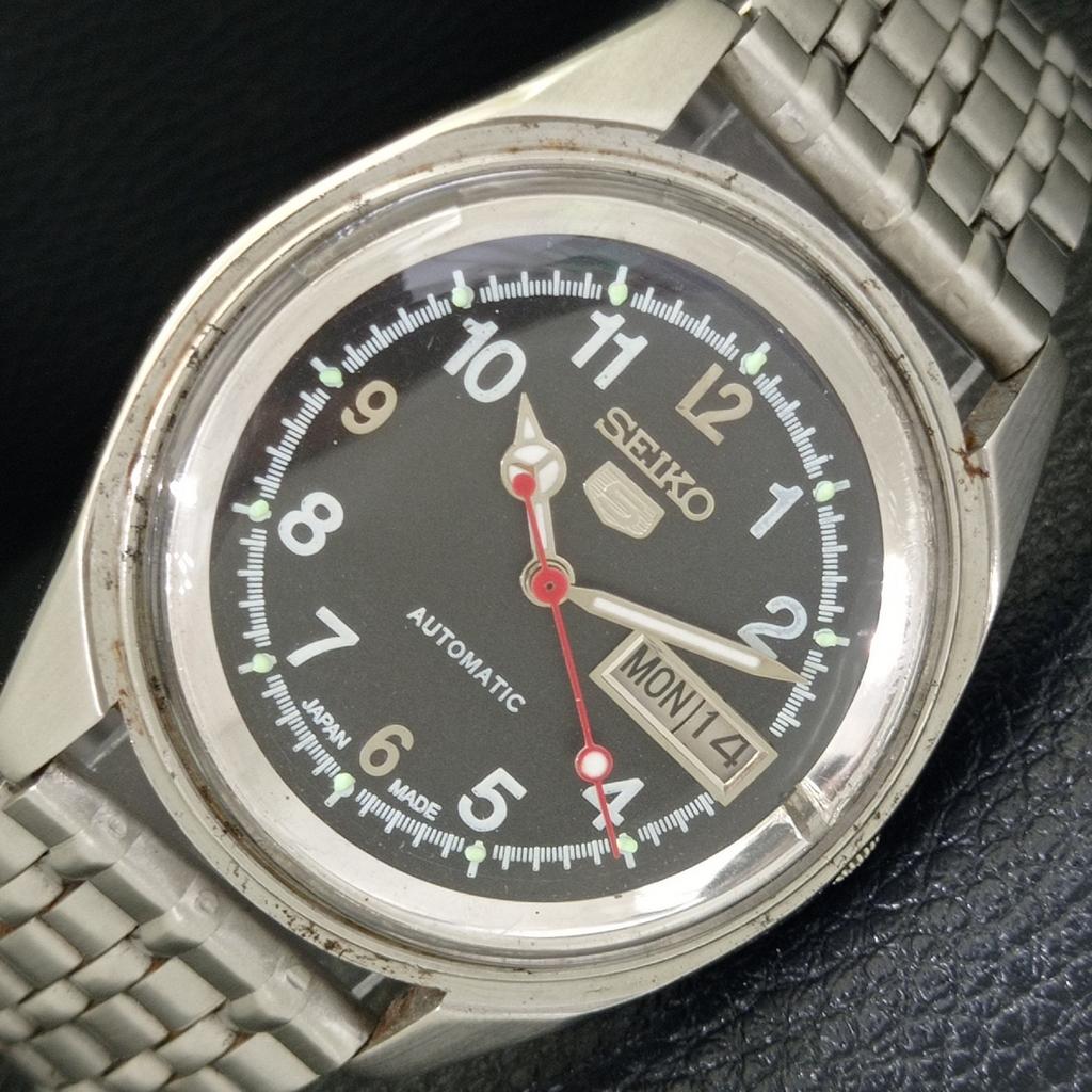 

ОРИГИНАЛЬНЫЕ ВИНТАЖНЫЕ МУЖСКИЕ ЧАСЫ SEIKO 5 AUTOMATIC 7019A JAPAN С ЧЕРНЫМ ЦИФЕРБЛАТОМ a702402-5 R124-a702402