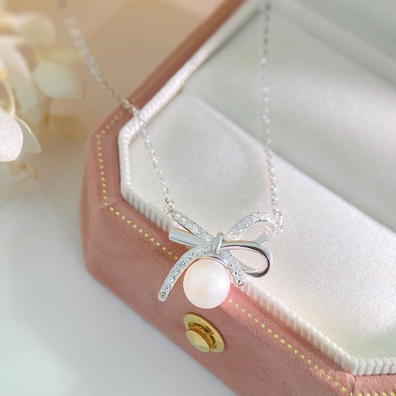 Collier de perles en forme de nœud papillon pour femme, léger, luxueux et de haute qualité, petit collier décoratif