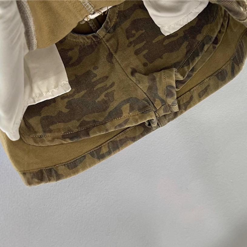 Three-dimensional pocket tooling camouflage denim skirt 2025 summer new Spice Girl street A word anti-light skirt