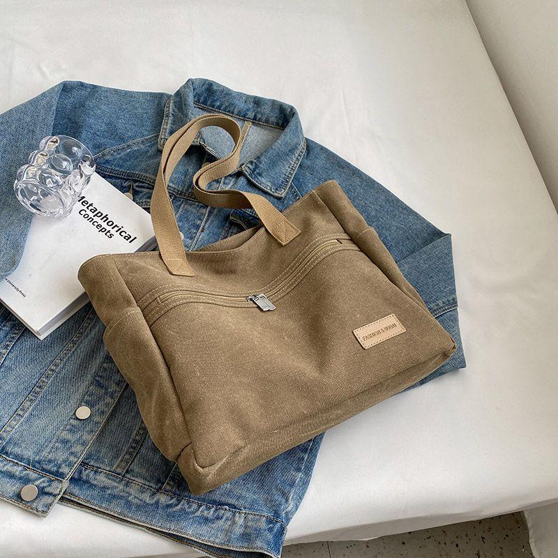 

Bags women s large-capacity new summer versatile casual canvas shoulder bag college students commuting tote bag хаки